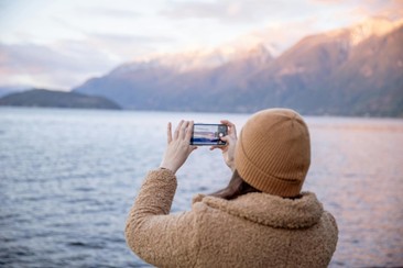 woman taking a photo of the view