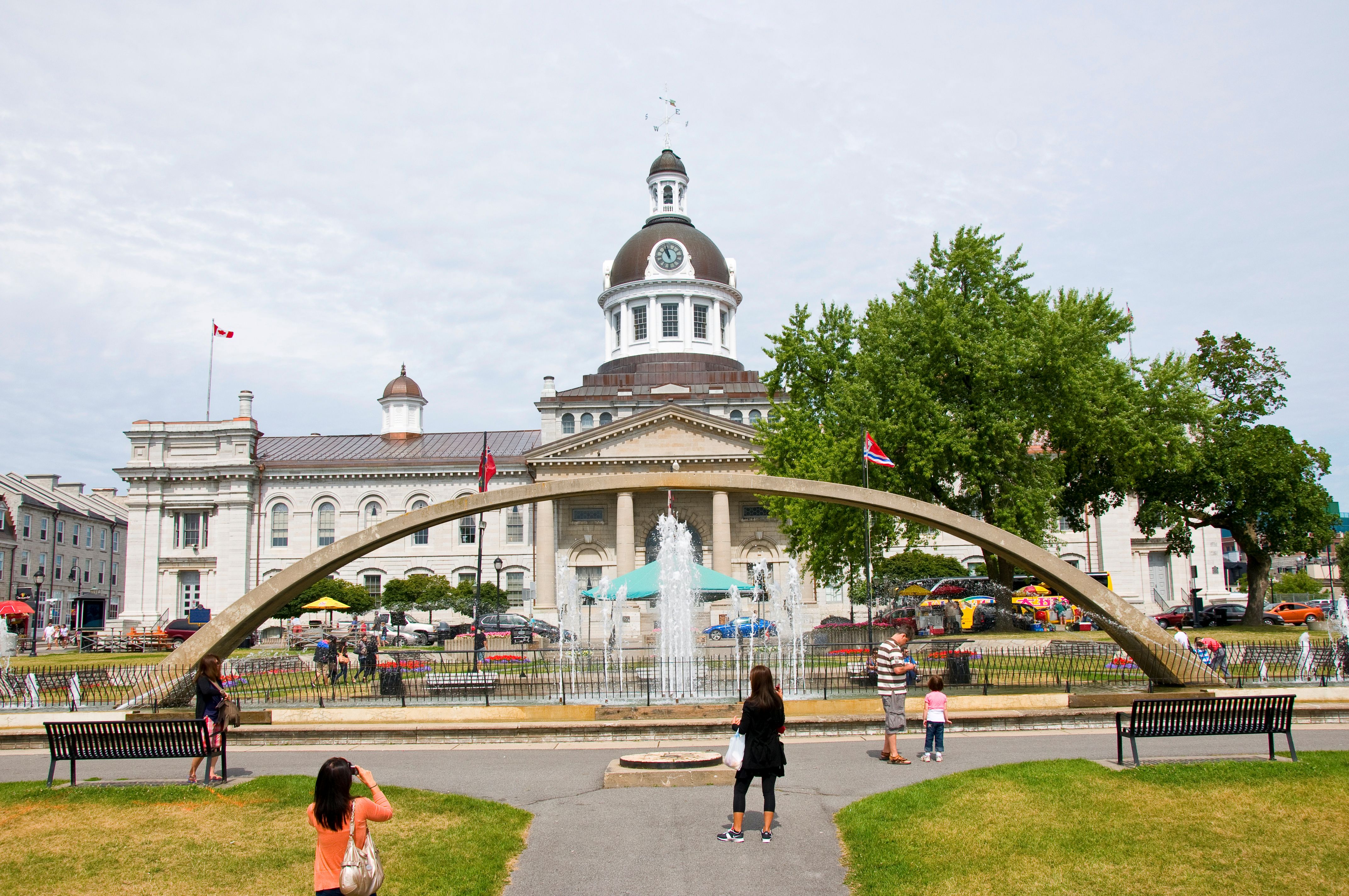 large white building with people walking around it