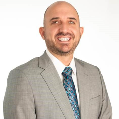 Travis Milum headshot