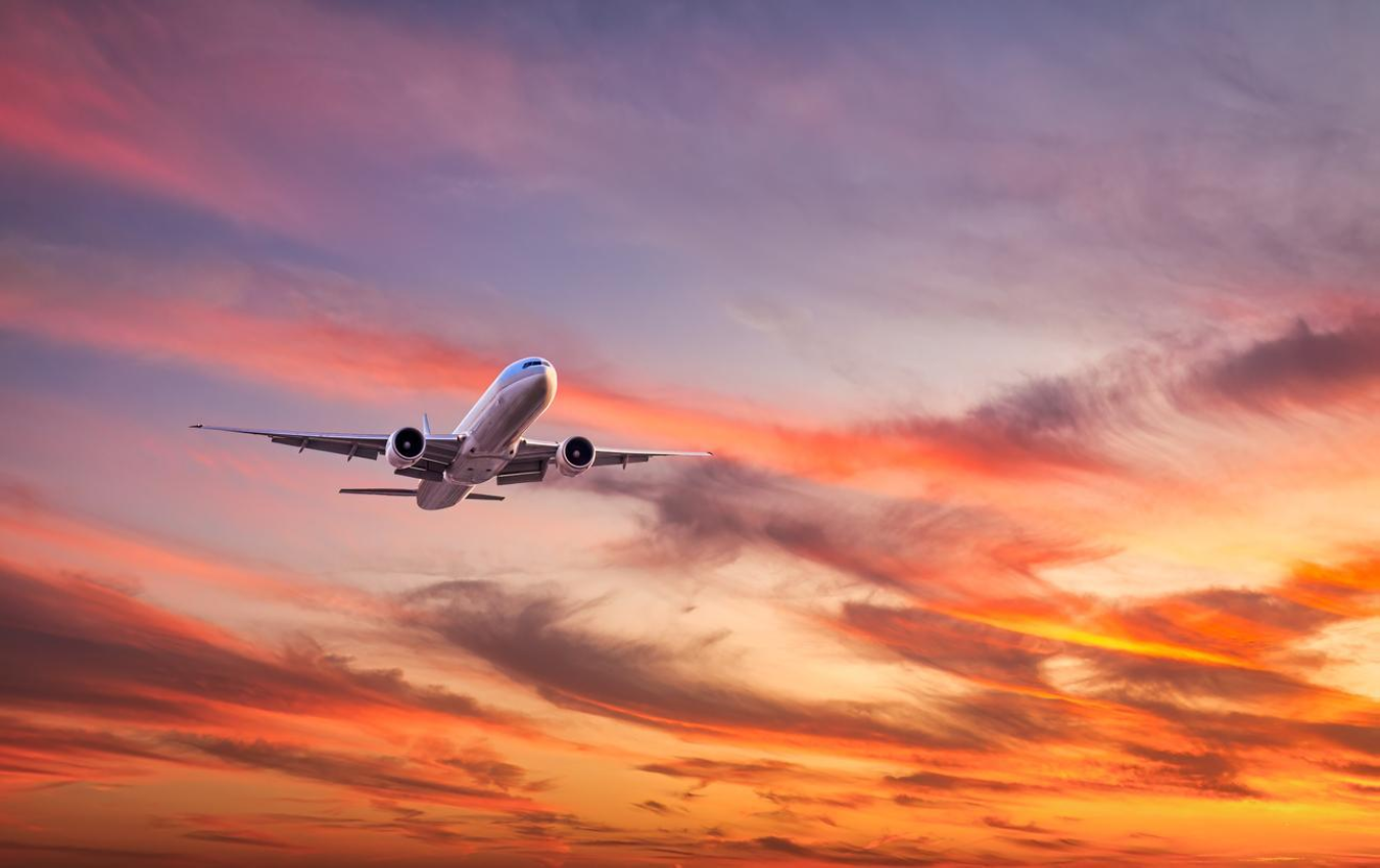 plane at sunset