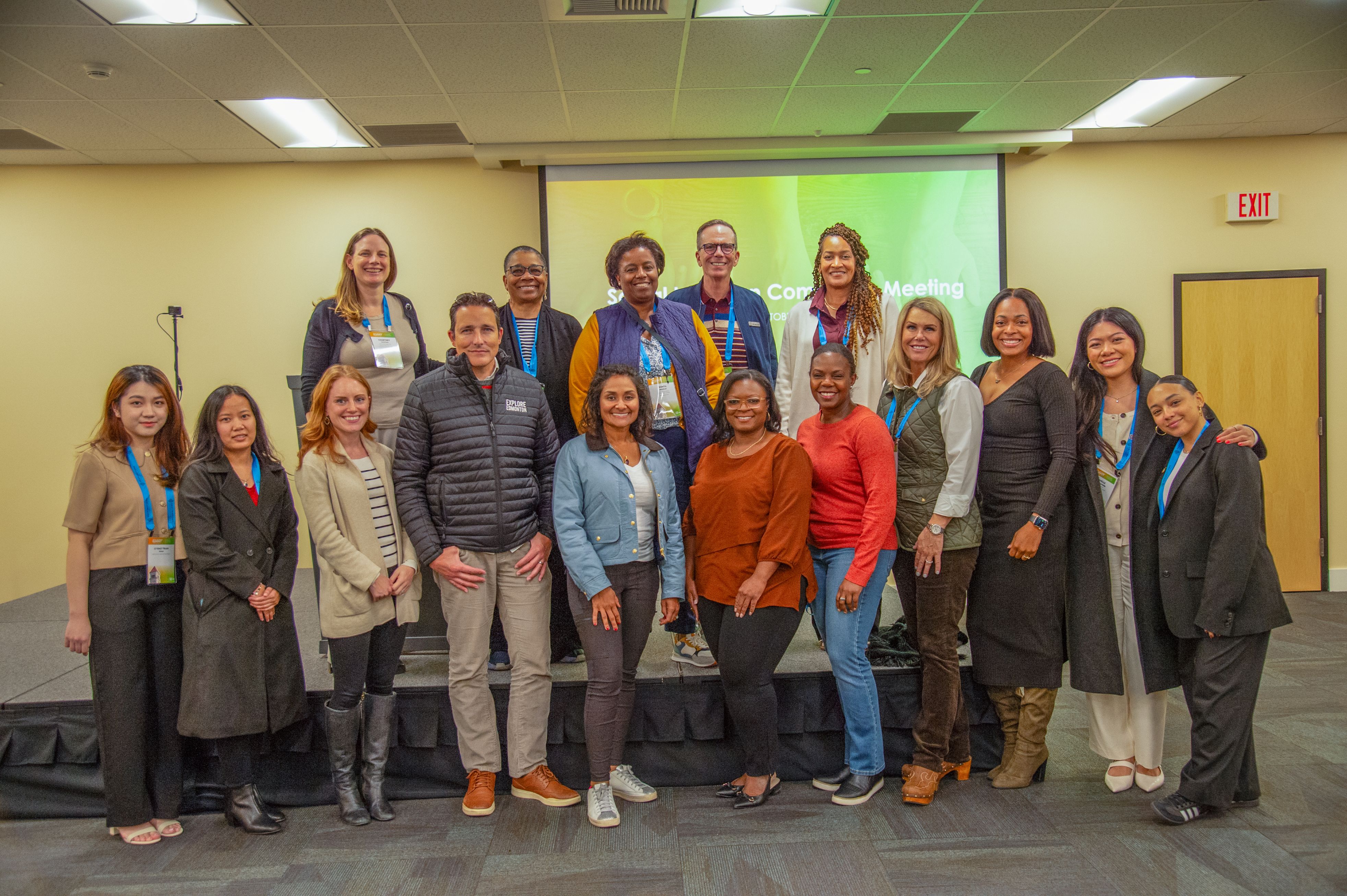 Social Impact Committee pose for a photo at their committee meeting in Spokane