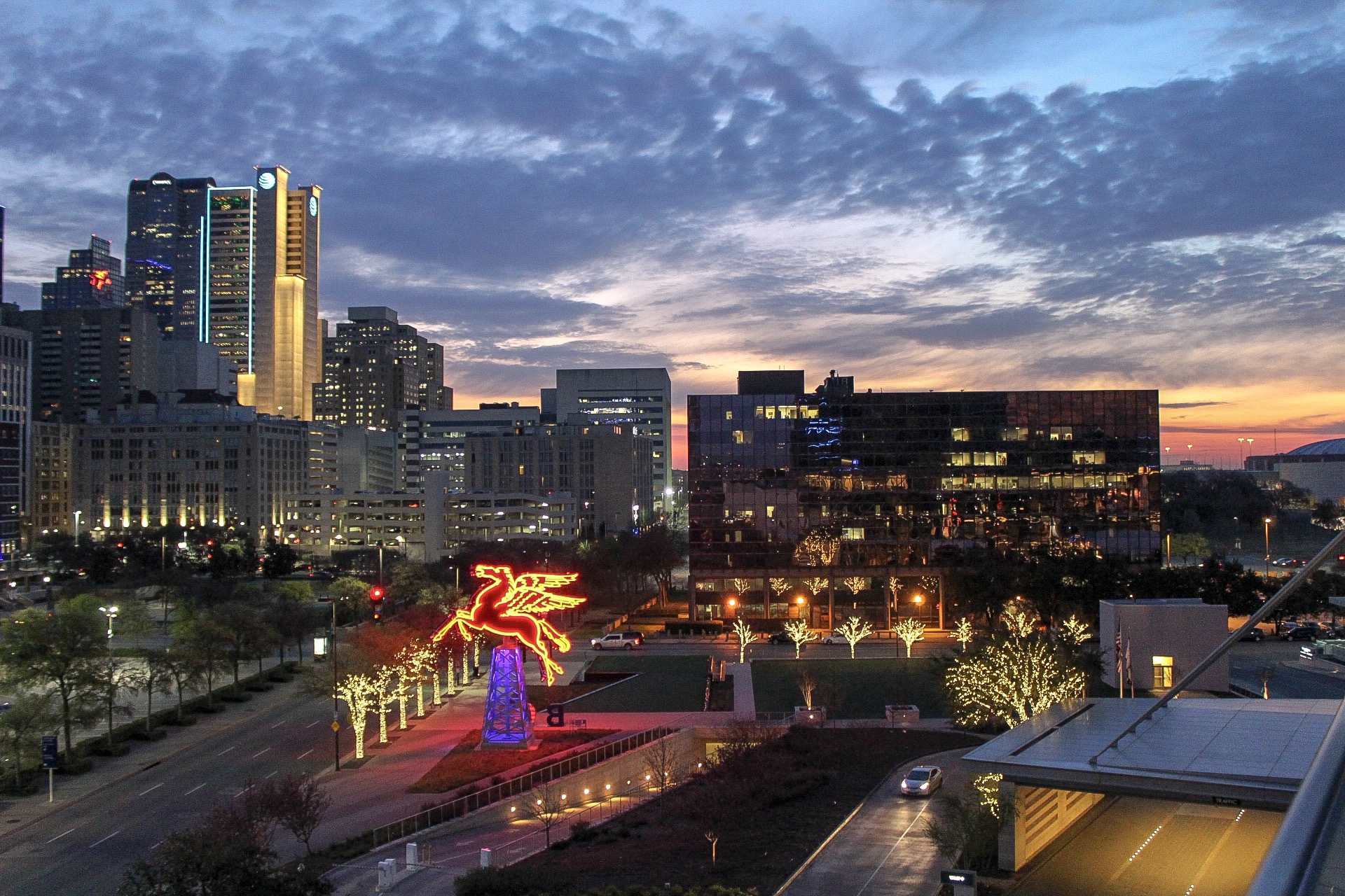 Dallas skyline at dusk with Pegasus