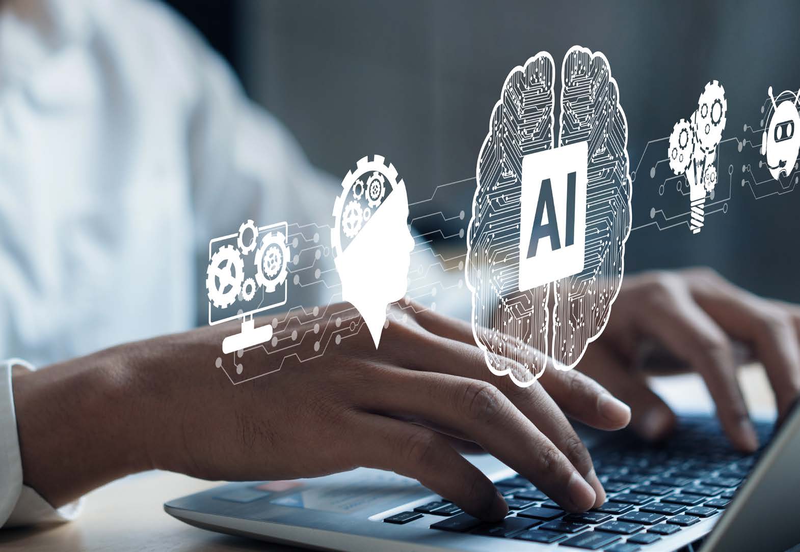 hands typing with AI icons above the keyboard