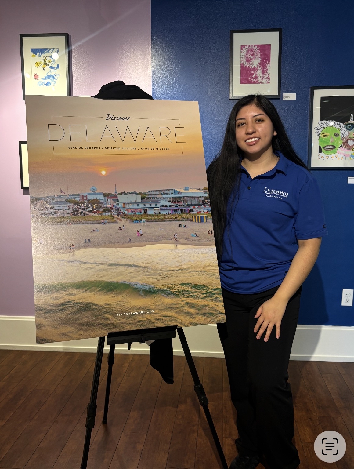Kimberly Berduo Velasquez with Delaware sign