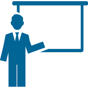 speaker presents in front of a screen