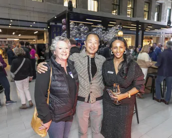 Three members networking at a Destinations International event