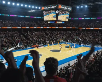 basketball game with huge crowd cheering