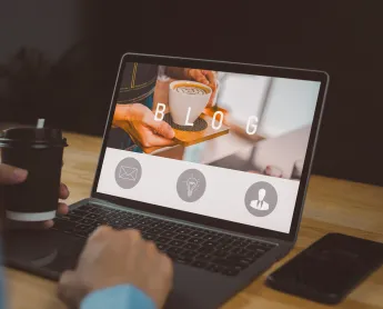 computer screen showing the word "BLOG"