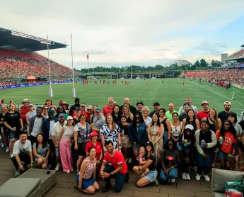 Ottawa Tourism team photo on a soccer field