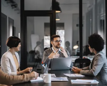 man leads presentation to his colleagues