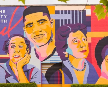 Icons Mural in Jackson, MS that includes colorful depictions of the city's notable citizens