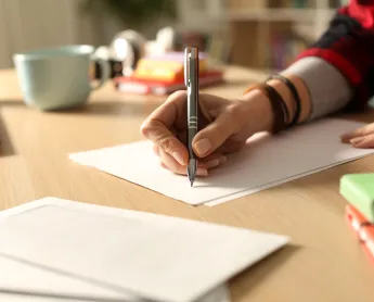 a person writes a letter