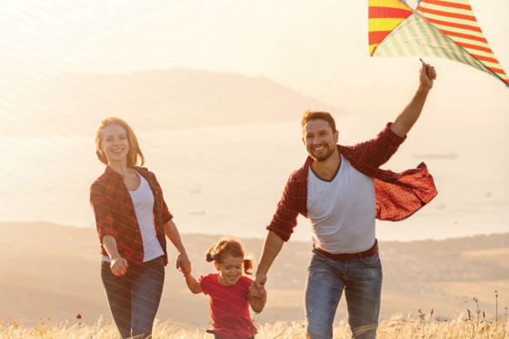 Family flying a kite