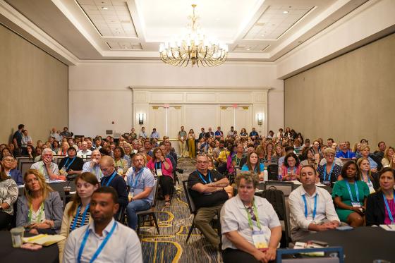 room of attendees at Annual Convention listening to the speaker