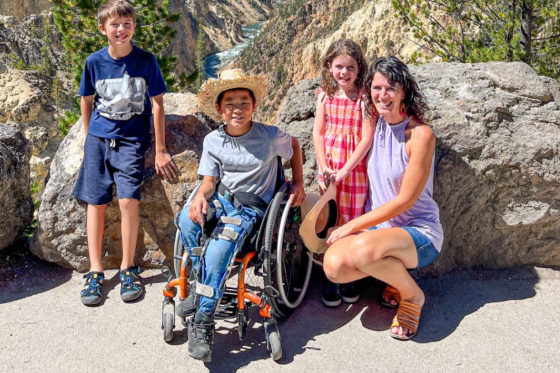 family posing for a photo on a hike