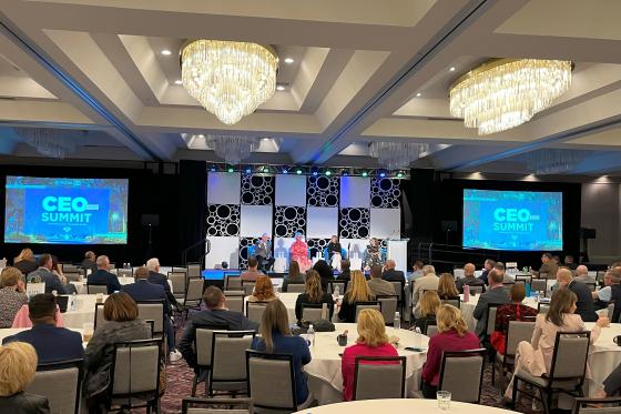panelists on stage at CEO Summit