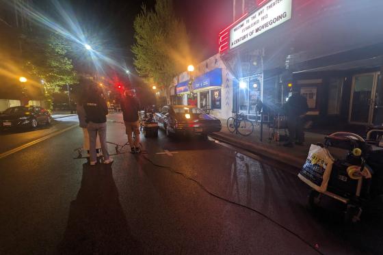 camera crew filming at night
