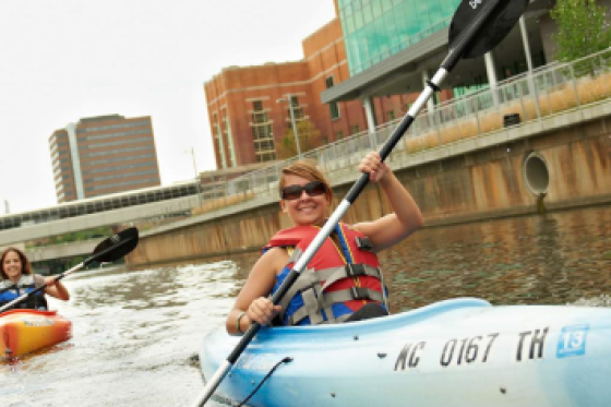 woman kayaking on the river