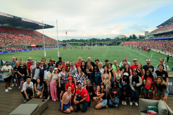 Ottawa Tourism team photo on a soccer field
