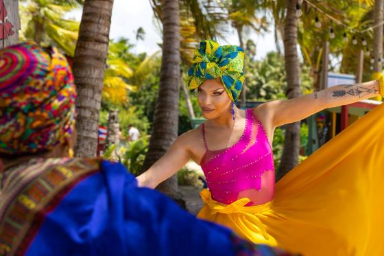 performer dancing in brightly colored clothing