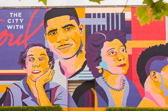 Icons Mural in Jackson, MS that includes colorful depictions of the city's notable citizens