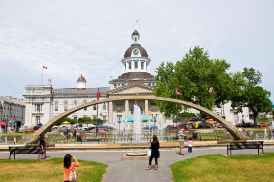 large white building with people walking around it