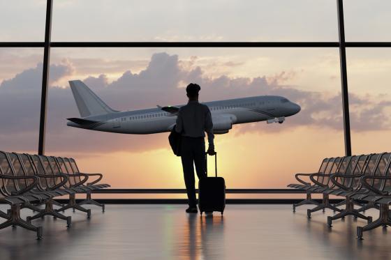 man with suitcase at the airport