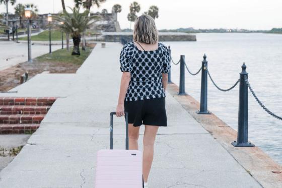 woman walking with suitcase