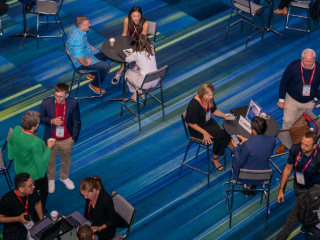 aerial view of partner networking tables at annual convention