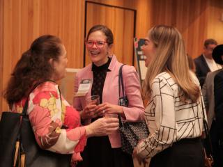 group of women networking at a conference
