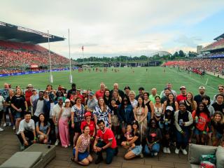 Ottawa Tourism team photo on a soccer field