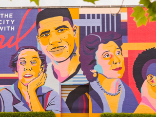 Icons Mural in Jackson, MS that includes colorful depictions of the city's notable citizens