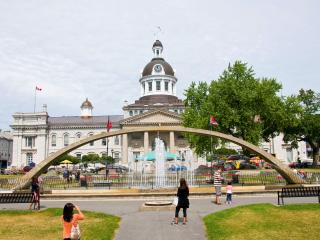 large white building with people walking around it
