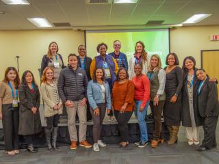 Social Impact Committee pose for a photo at their committee meeting in Spokane