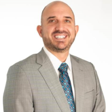 Travis Milum headshot