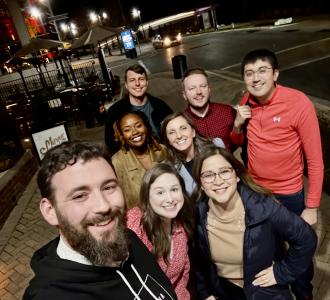 30 Under 30 alumni gather for a group photo during 2023 Business Events Industry Week.