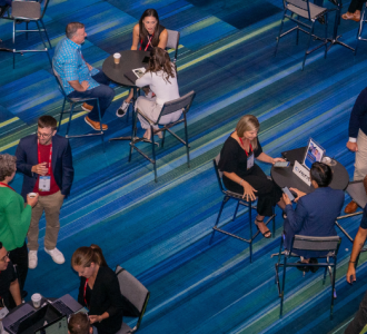 aerial view of partner networking tables at annual convention