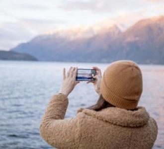 woman taking a photo of the view