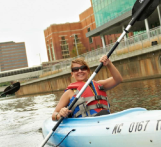 woman kayaking on the river
