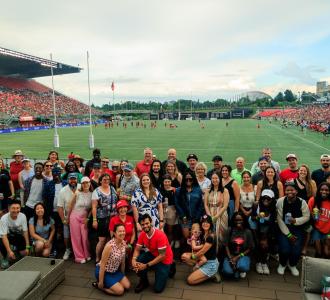 Ottawa Tourism team photo on a soccer field