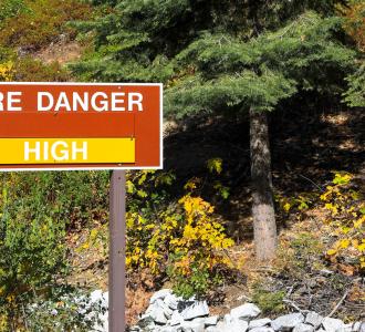 A sign in the Yosemite national park warns residents of the high wildfire danger in summer