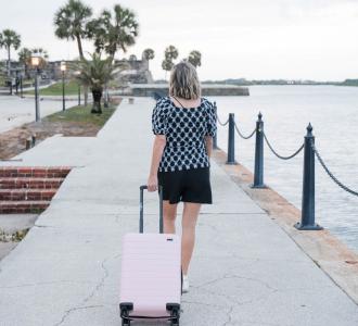 woman walking with suitcase