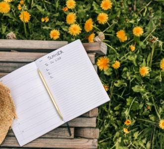 Open notebook with "Summer To Do List" written inside